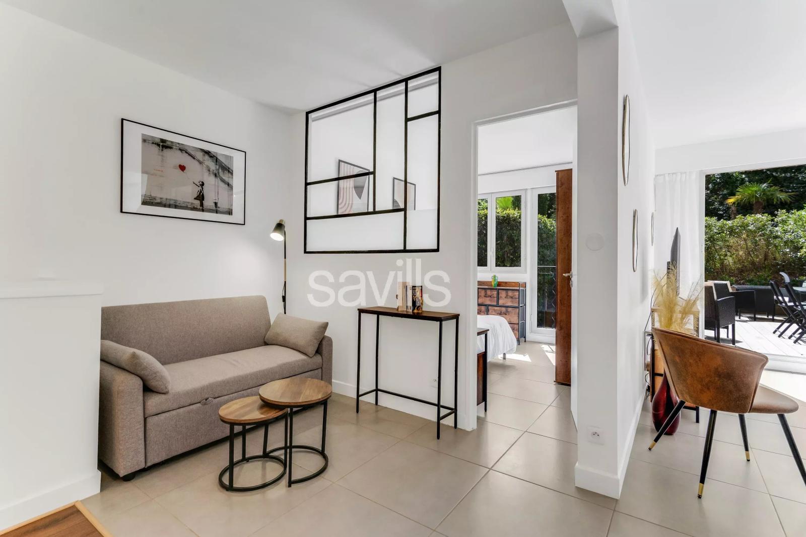 Appartement 3 pièces - rénové avec jardinet / terrasse - à pied du centre