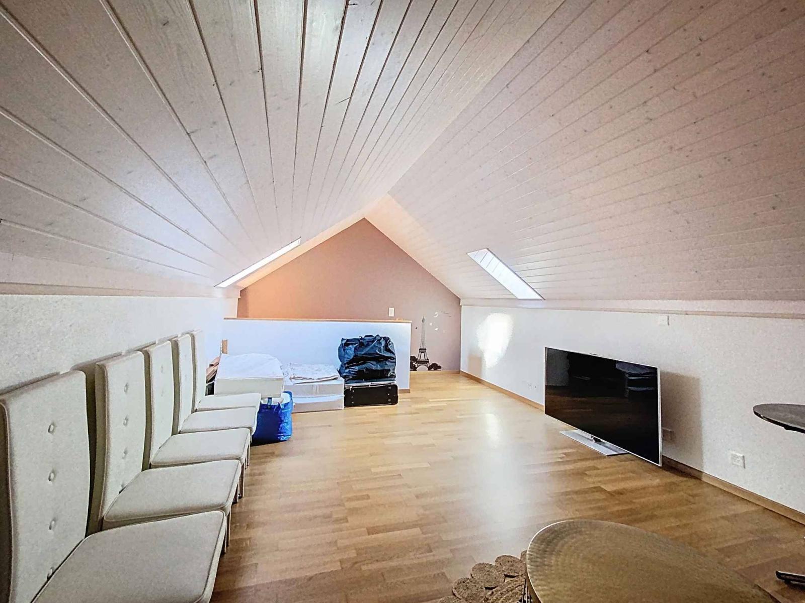 Magnifique duplex en attique avec combles