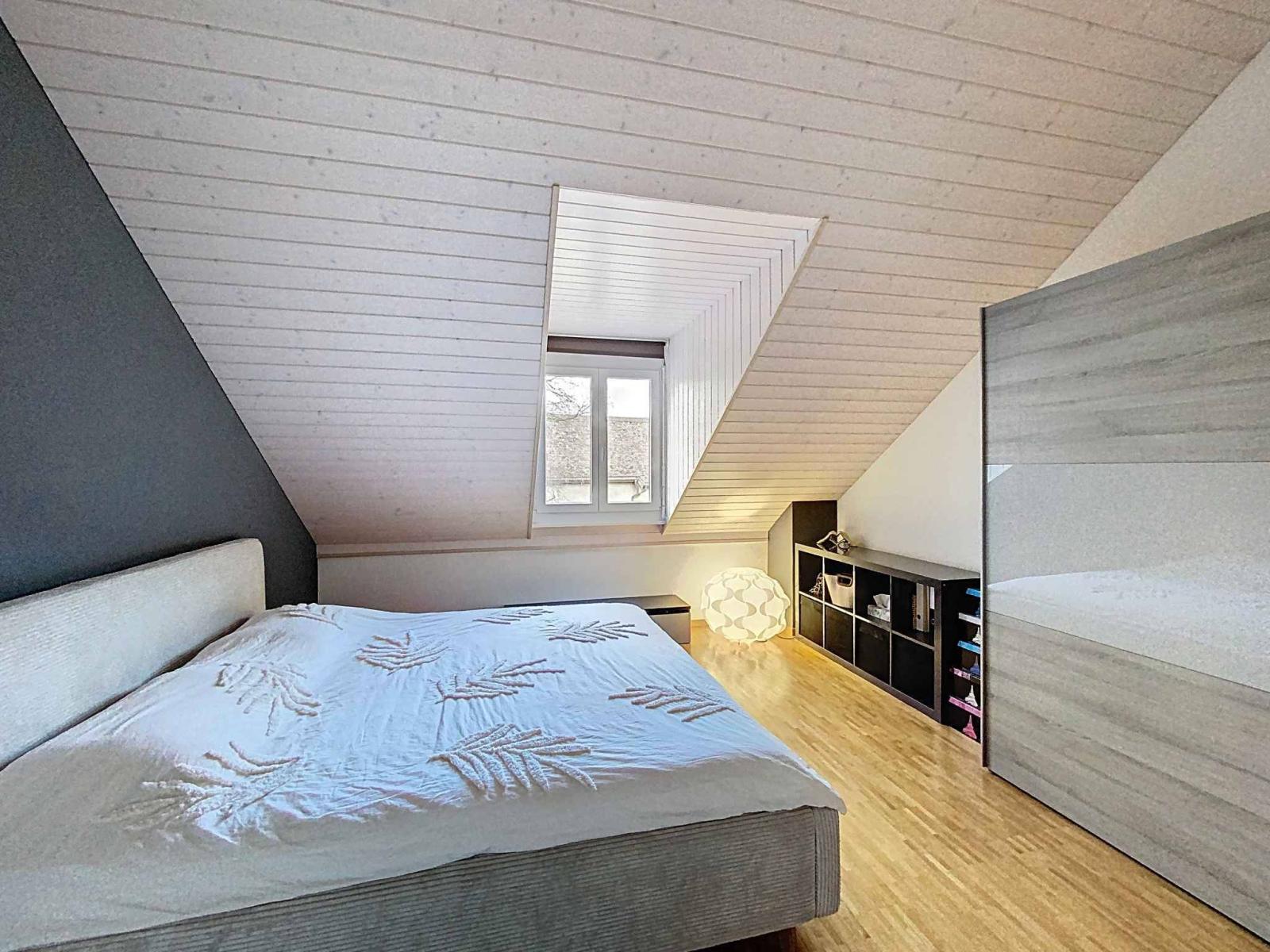 Magnifique duplex en attique avec combles 