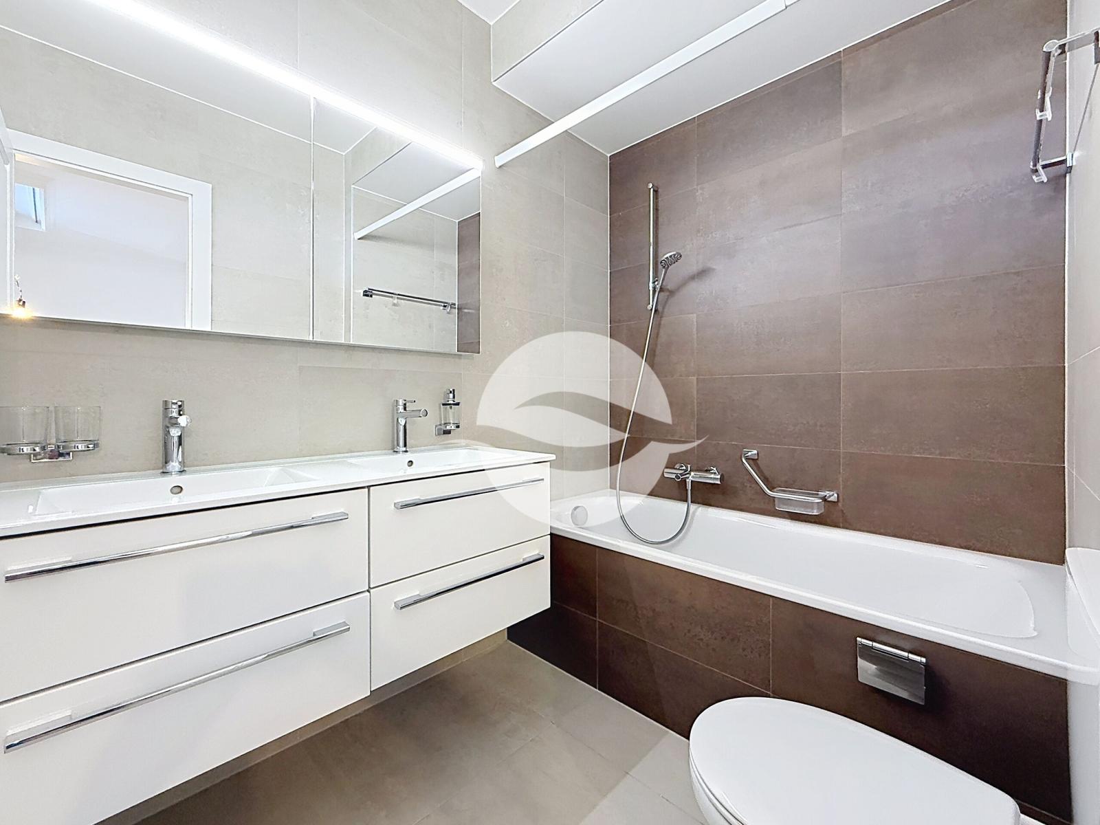 Duplex de 6,5 pièces avec grand jardin