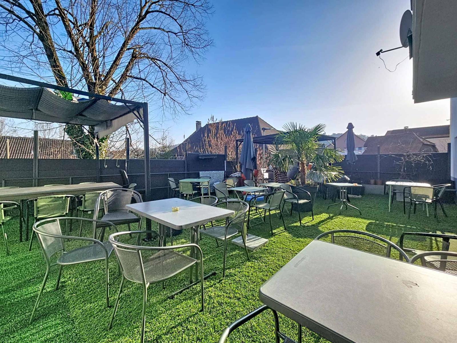 Immeuble d’habitation avec café-restaurant au coeur de la Broye