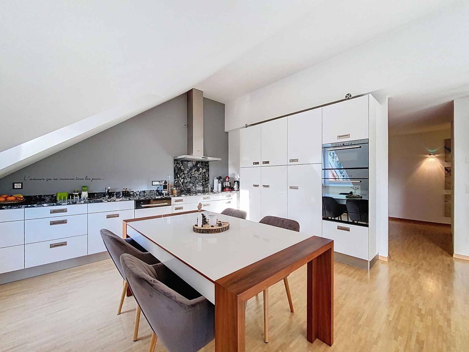Magnifique duplex en attique avec combles