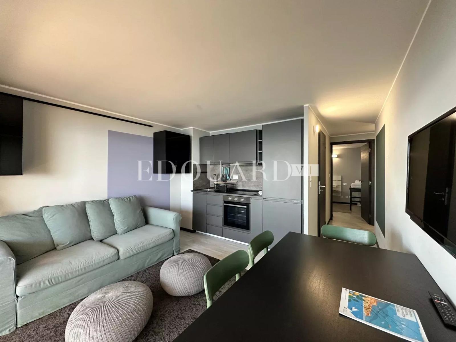 En exclusivité trois pièces avec balcon, splendide vue mer et garage, proche des écoles et du Parc Koaland