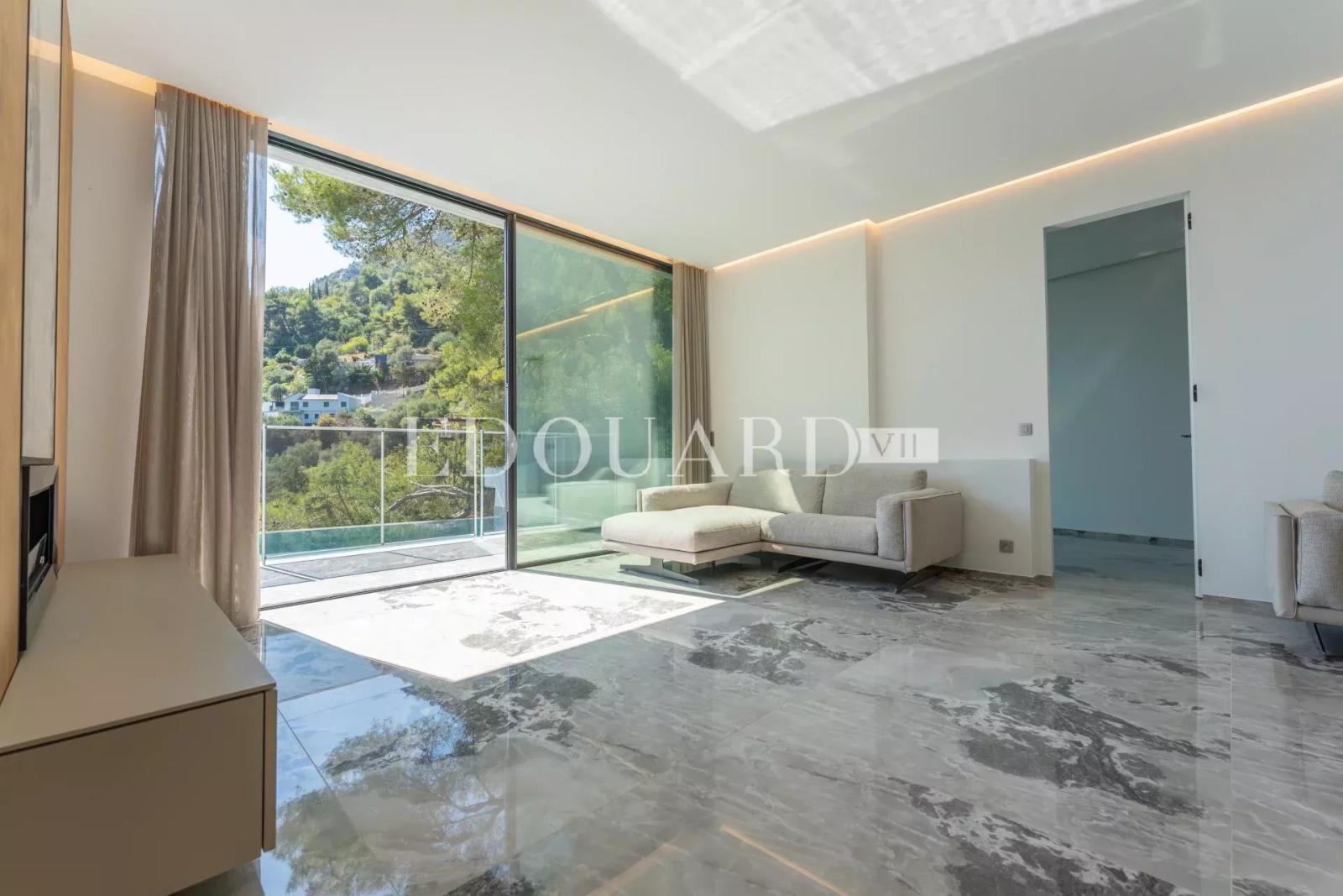 En exclusivité villa neuve avec domotique, ascenseur, grandes terrasses, piscine à débordement et belle vue mer