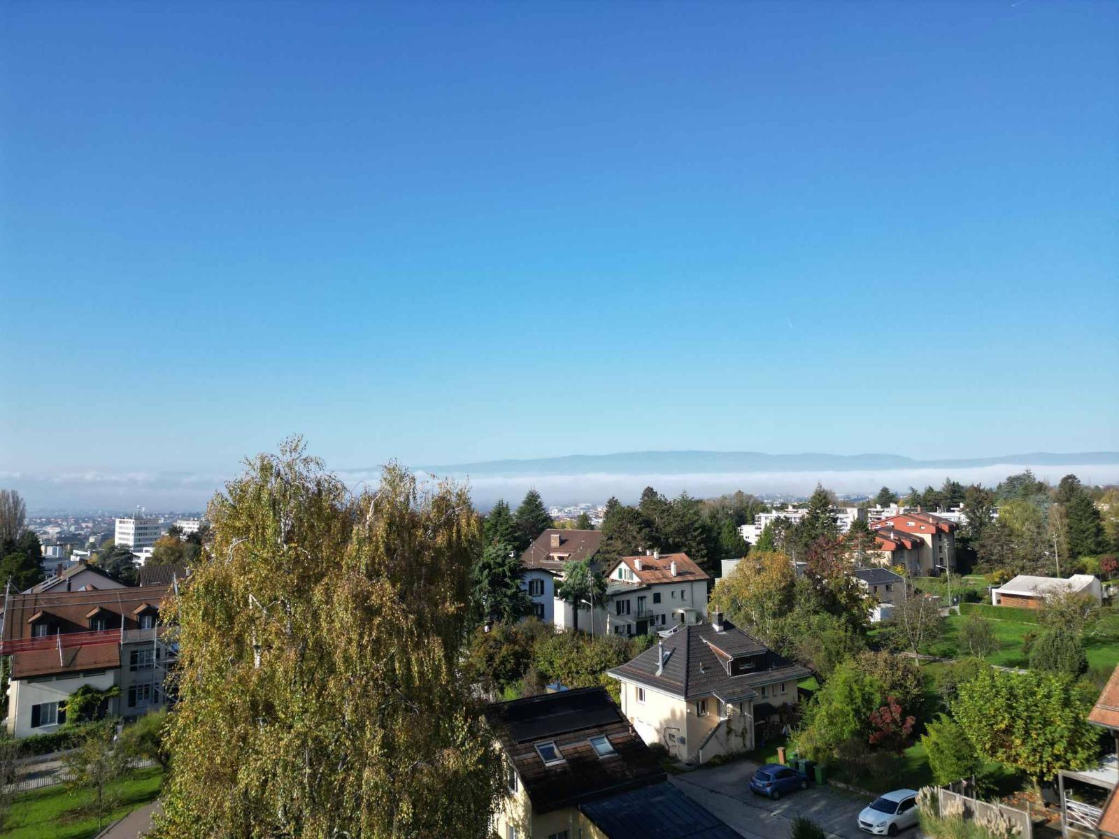 Attique MINERGIE neuf avec vue panoramique et petit jardin-potager