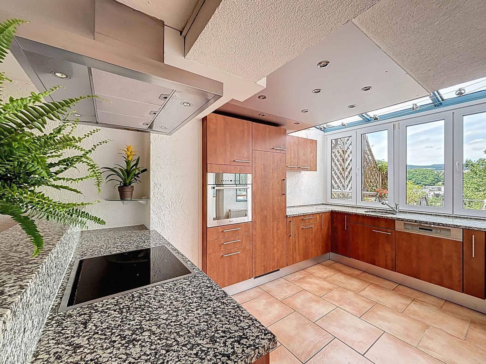 Triplex de 3.5 pièces avec terrasses et studio indépendant