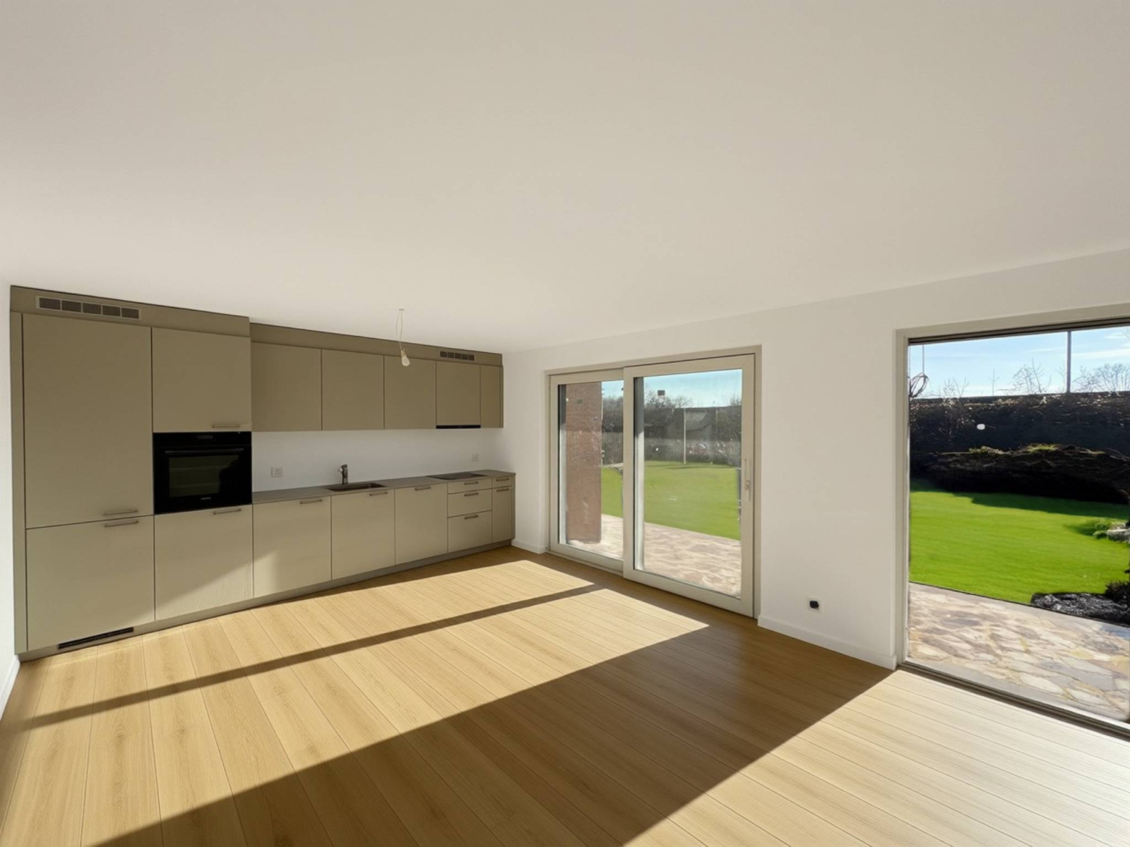 Appartement de 3.5 pièces neuf au rez-de-chaussée avec terrasse