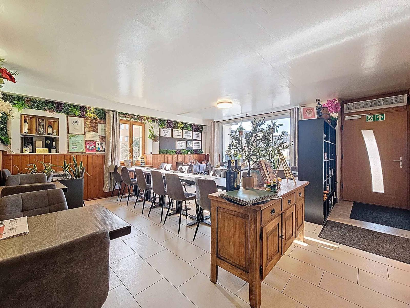 Immeuble d’habitation avec café-restaurant au coeur de la Broye