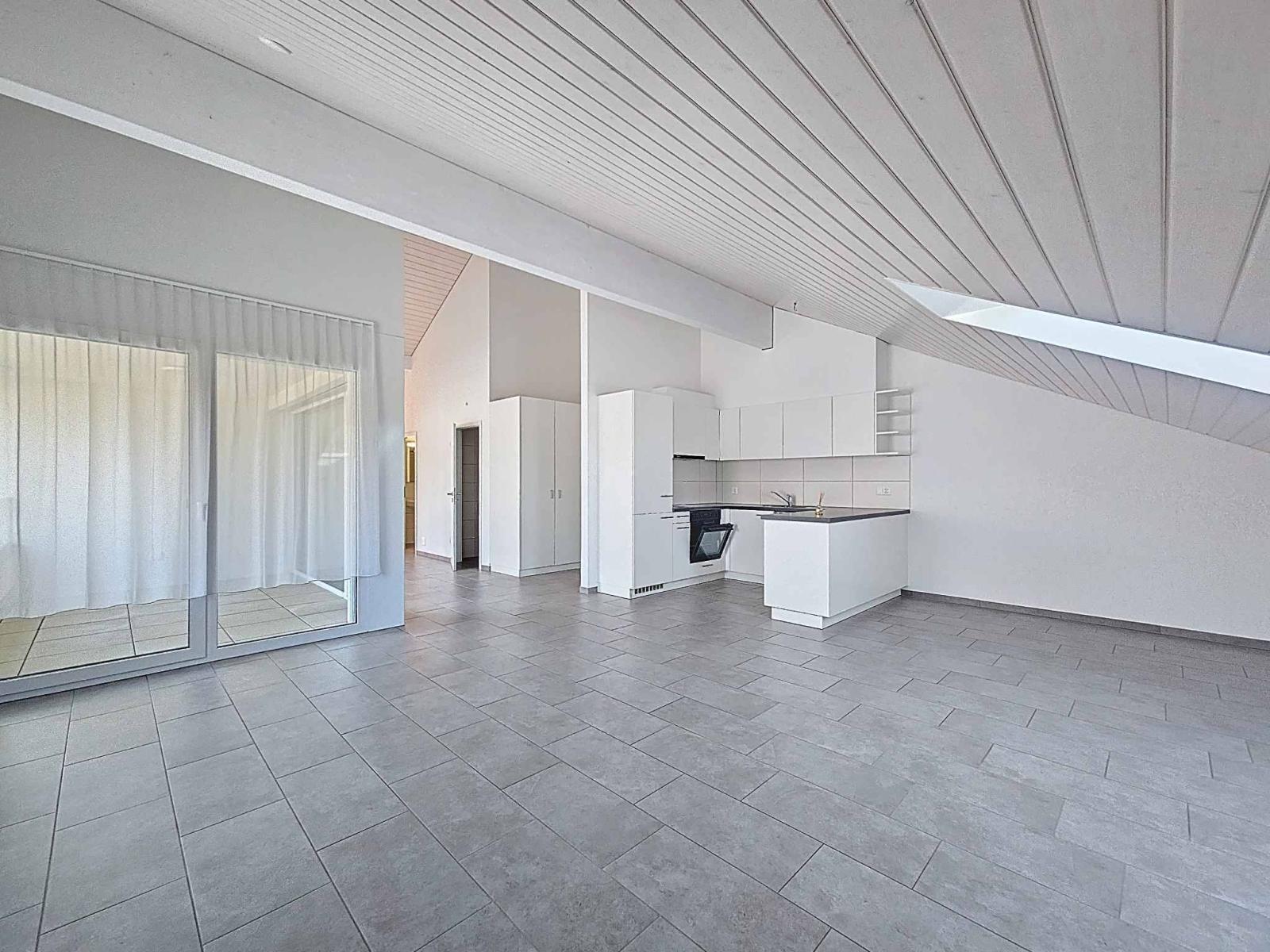Appartement moderne de 3.5 pièces avec places de parc couvertes