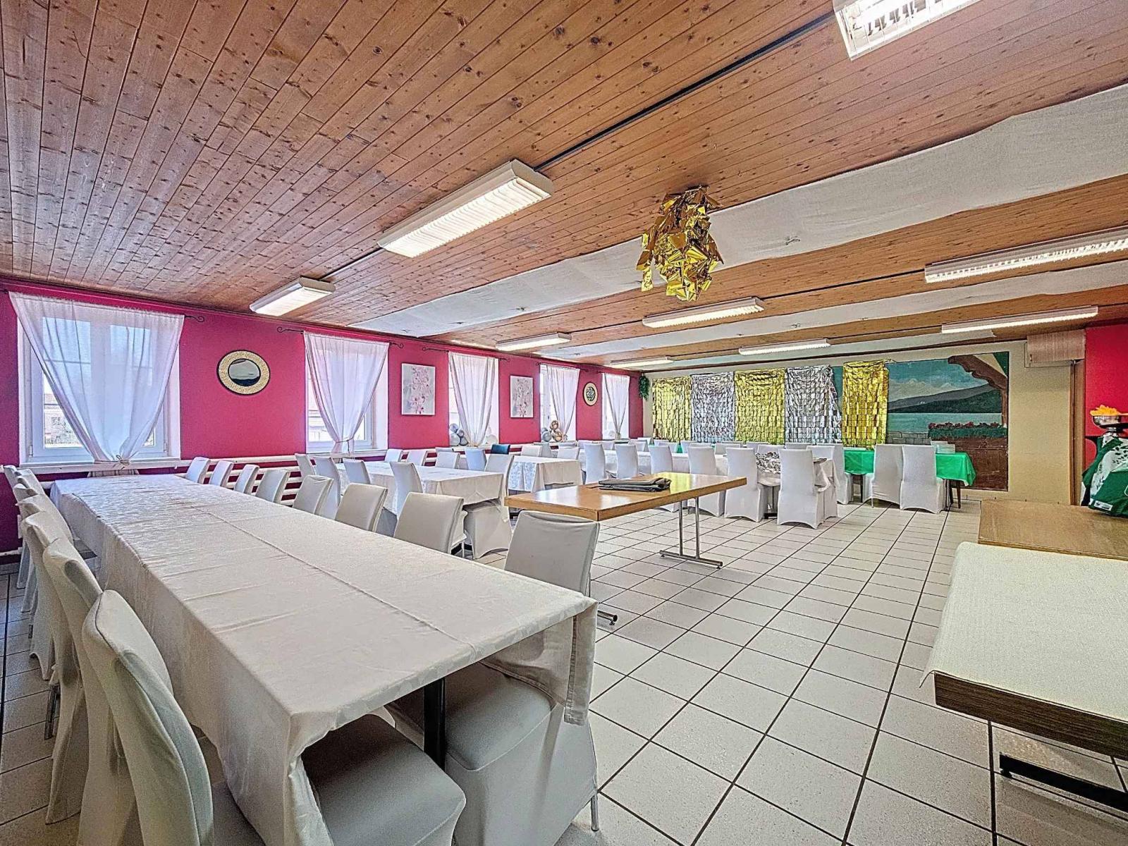 Immeuble d’habitation avec café-restaurant au coeur de la Broye