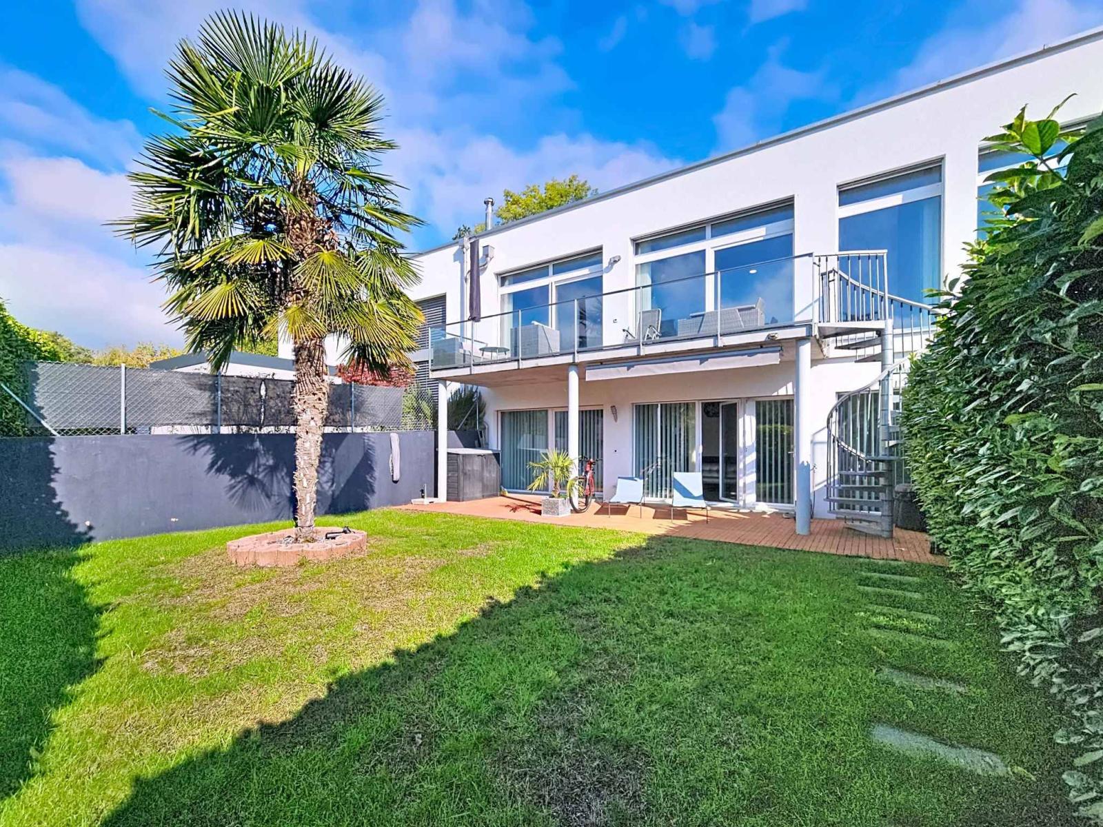 Maison contiguë de 5.5 pièces avec jardin et vignes