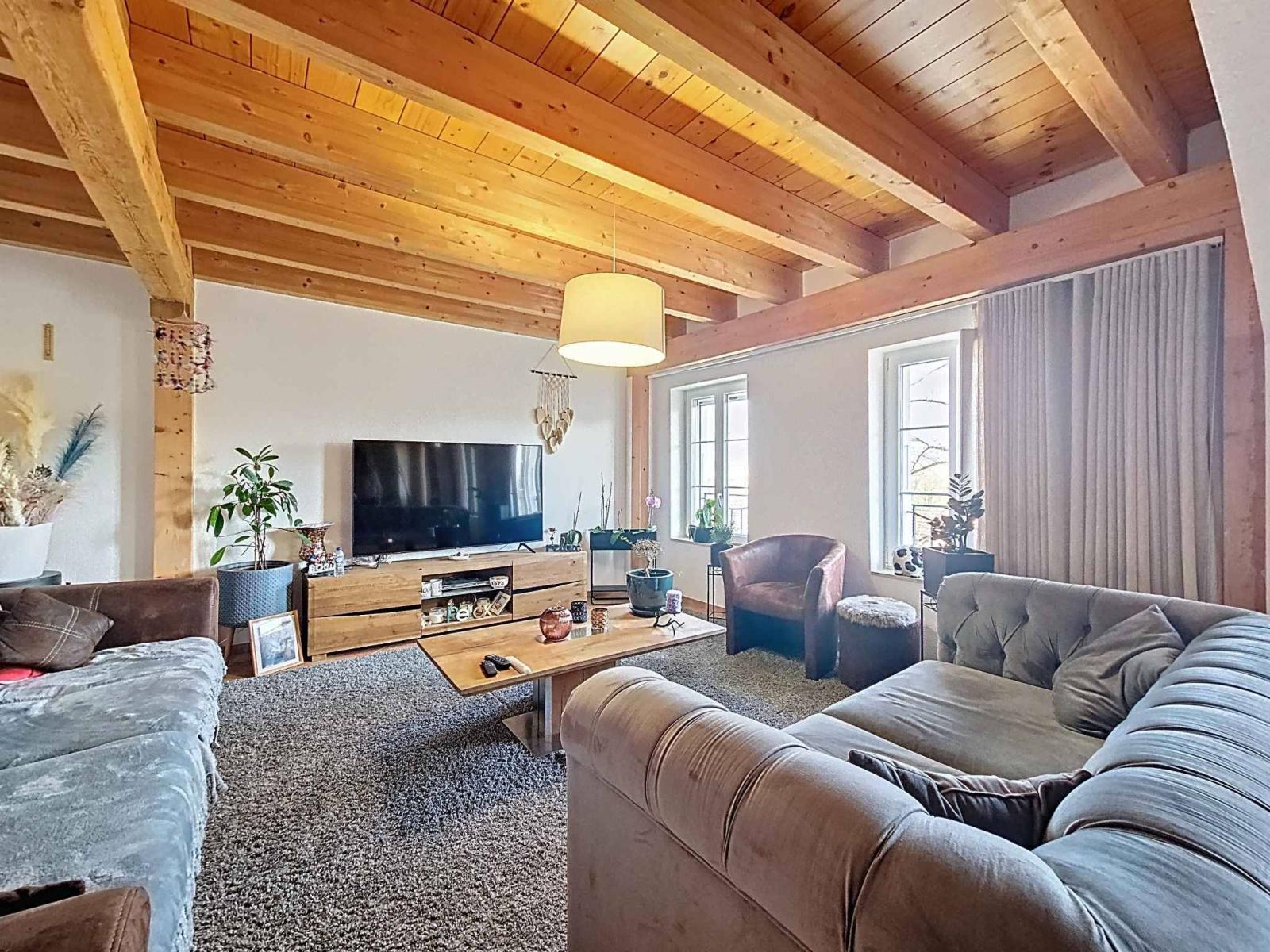 Immeuble d’habitation avec café-restaurant au coeur de la Broye